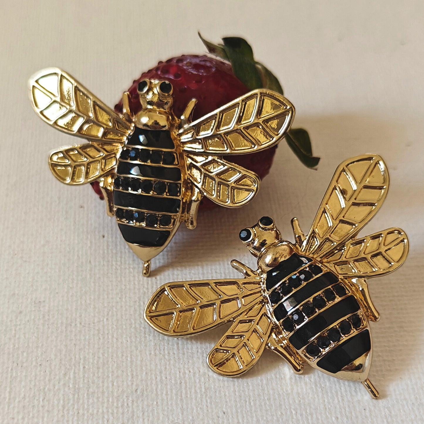 Honeybee on a runway statement studs