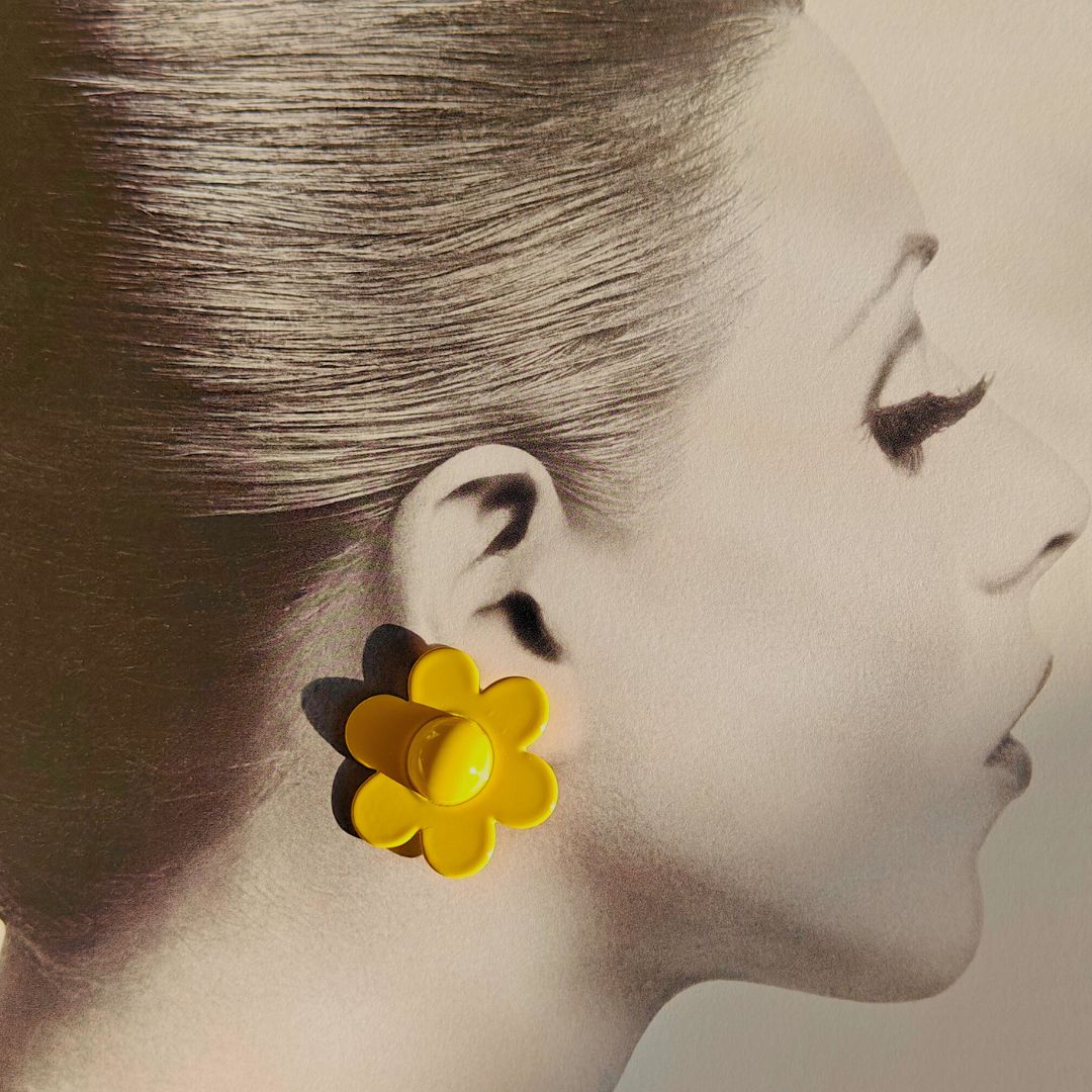 Yellow statement pop studs