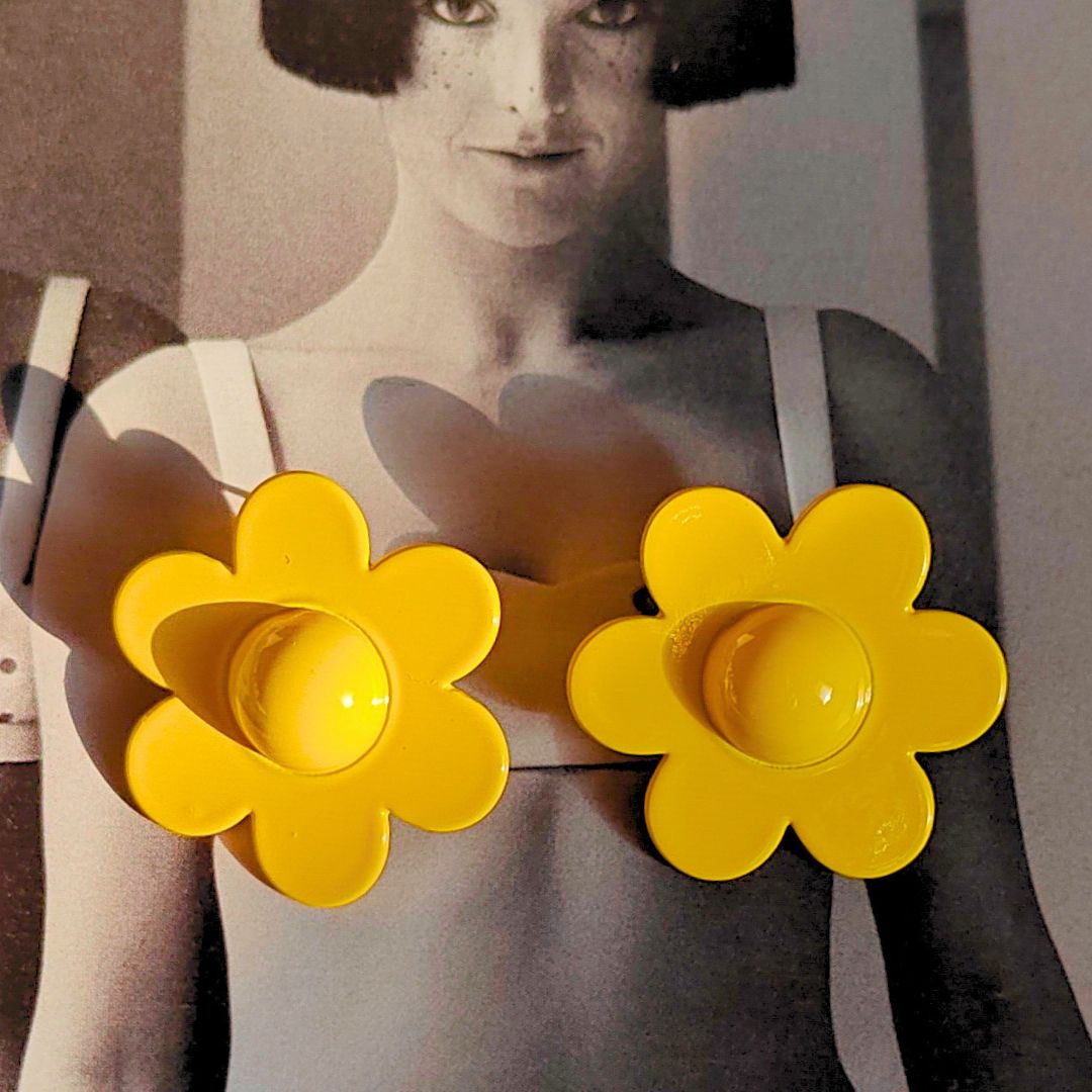 Yellow statement pop studs