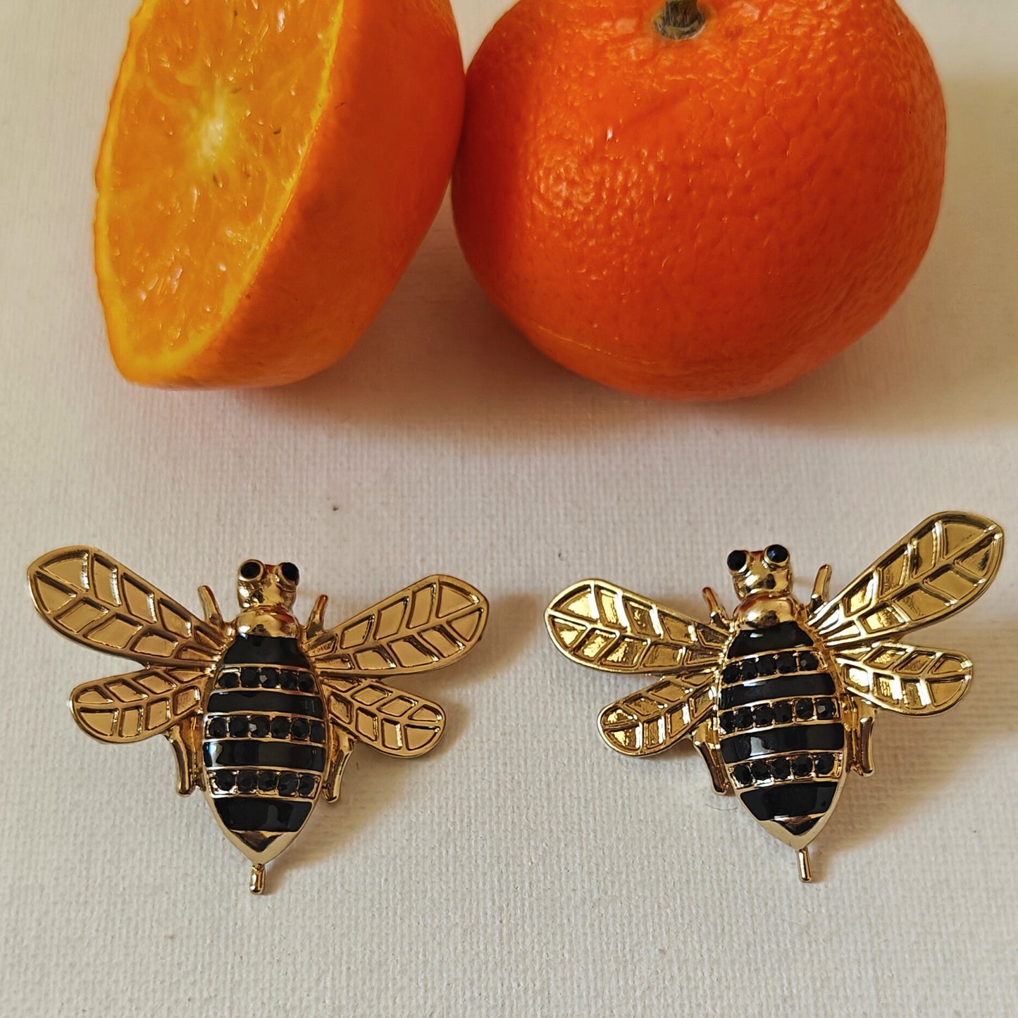 Honeybee on a runway statement studs