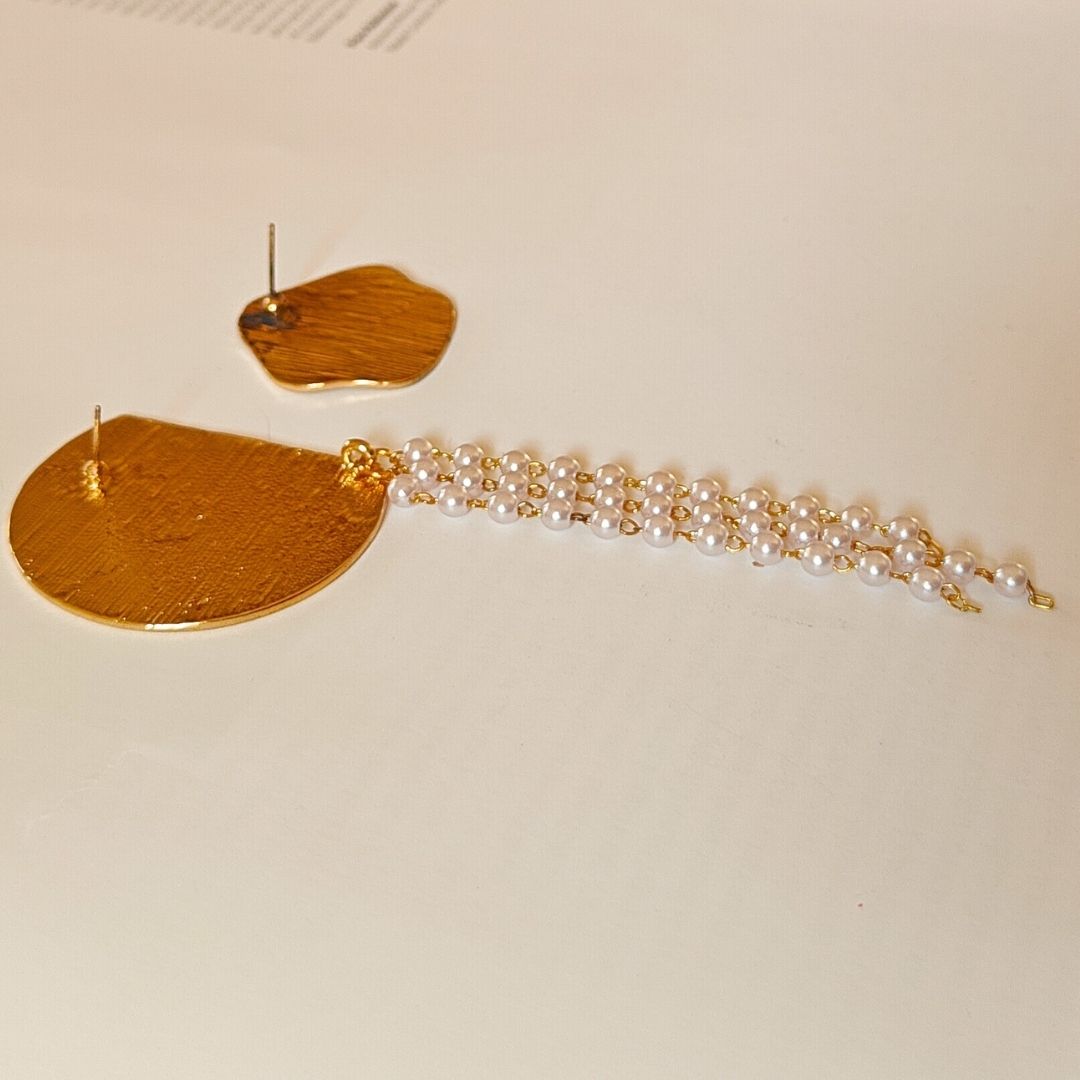 Asymmetric statement studs