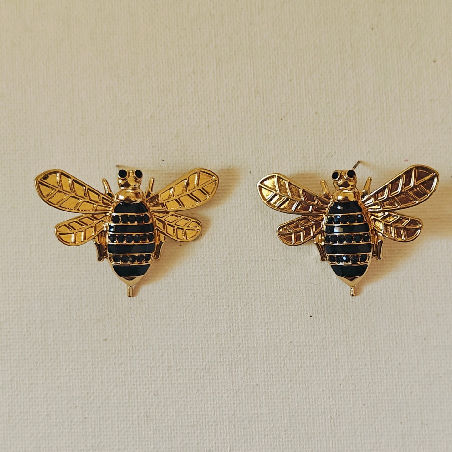 Honeybee on a runway statement studs