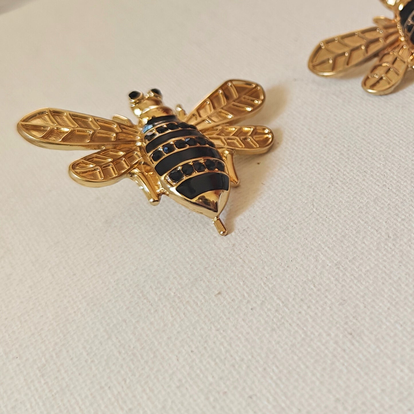 Honeybee on a runway statement studs