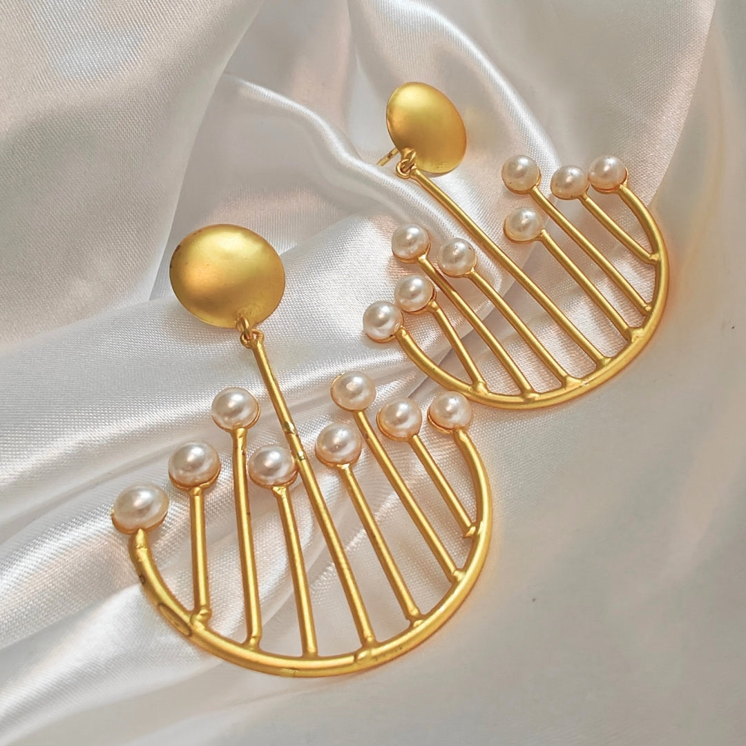 Sea urchin symmetry statement earrings