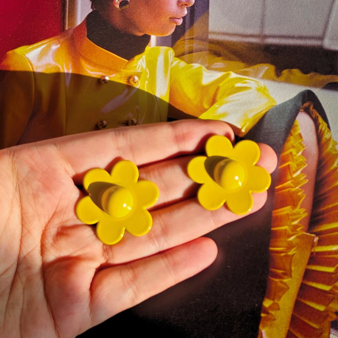 Yellow statement pop studs