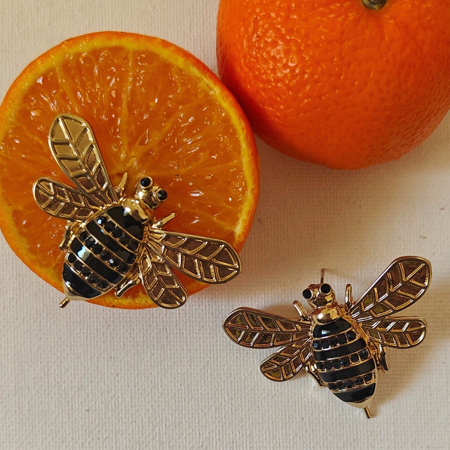 Honeybee on a runway statement studs
