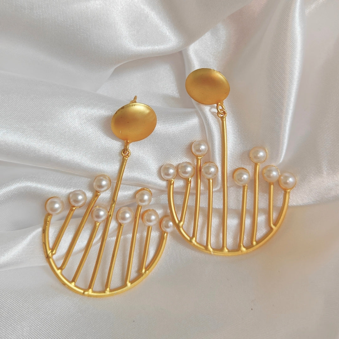 Sea urchin symmetry statement earrings